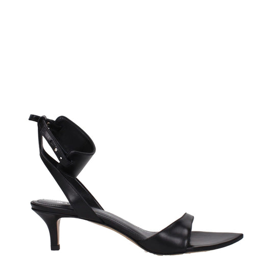 Isabel Marant Black Leather Flat Sandals with buckle closure, open toe, and mid heels. Stylish and elegant women's footwear.
