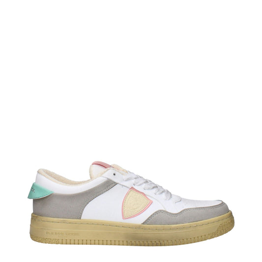 Philippe Model White Leather Low Top Sneakers with vintage and aged effect, featuring front, back, and side logos, rubber sole, teal accents.
