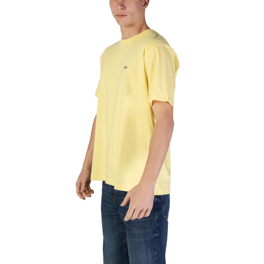Hugo Boss Yellow Cotton T-Shirt on model, showcasing short sleeves, regular fit, crew neck, and embroidered BOSS logo on chest.