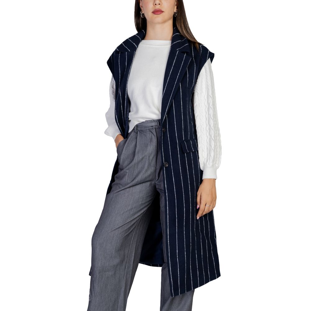 Woman wearing ICHI Blue Polyester Sleeveless Jacket with pinstripes, featuring wide lapels and a modern longline design.
