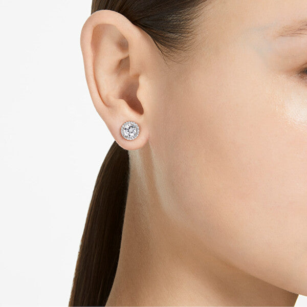 SWAROVSKI Mod. 5636269 stud earrings on woman's ear