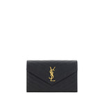 Saint Laurent Logoed Shoulder Bag in black leather with gold embossed YSL logo and chain shoulder strap. Elegant and functional design.