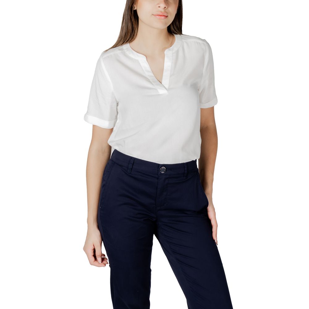 Street One White Viscose Blouse with V-neckline and rolled-up sleeves, perfect for casual summer look, paired with navy trousers.