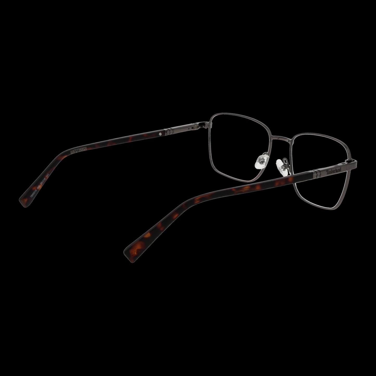TIMBERLAND MOD. TB50019 55006 gent's eyeglasses with rectangular metal frame and tortoise shell temples on a black background