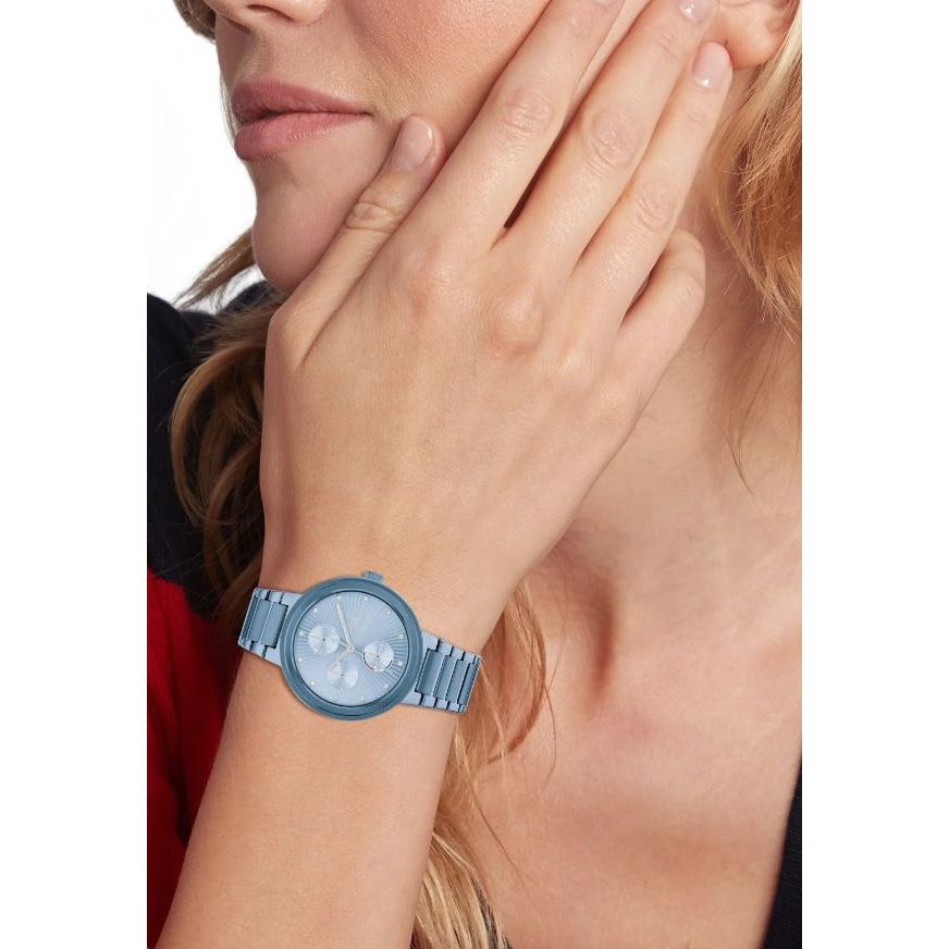 Woman wearing TOMMY HILFIGER Mod. 1782535 blue quartz analog watch on wrist, showing elegant design and features like water resistance.