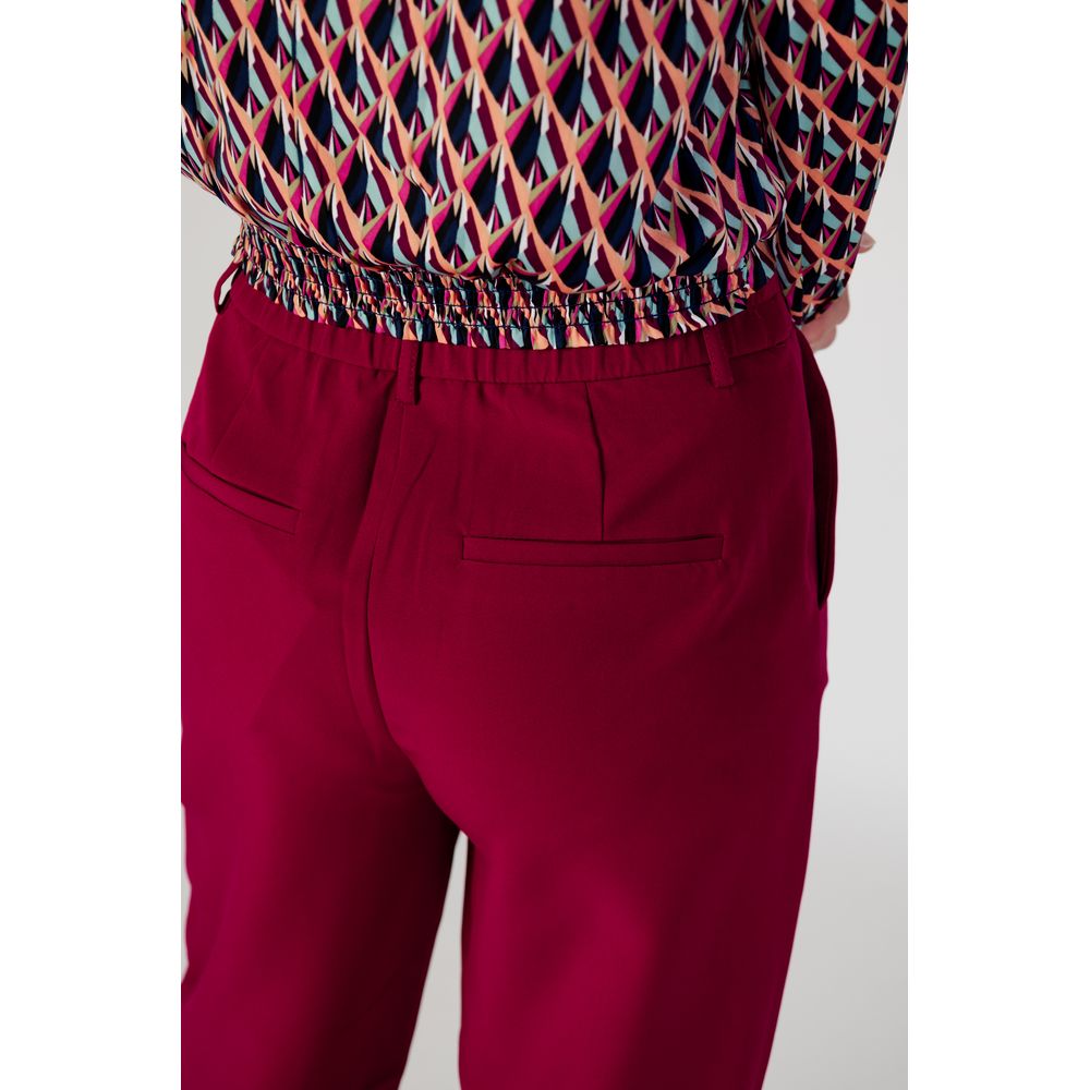 Back view of Vila Clothes Bordeaux Polyester Casual Pants showcasing elegant wide-leg design.