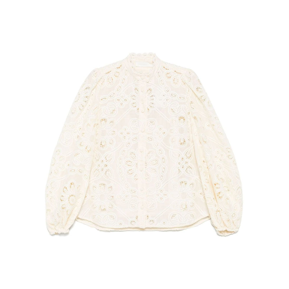 Zimmermann Shirts Ivory Rhiannon embroidered blouse with beige button fastening, cut-out floral detailing, and long elasticated cuff sleeves.