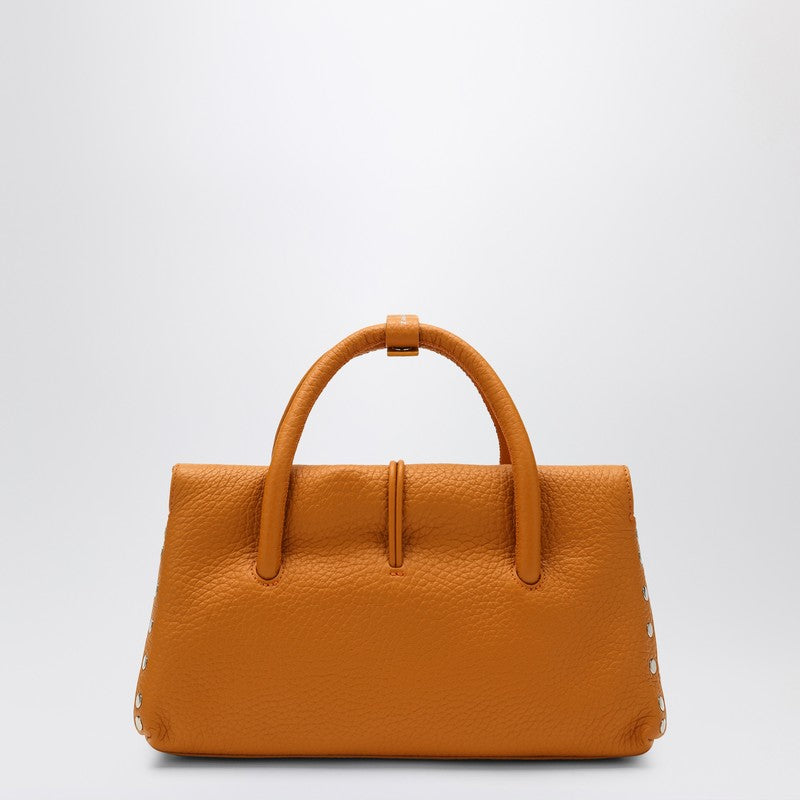 Front view with bag zipped and handles upright.