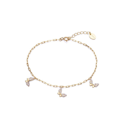 Elegant butterfly charm bracelet in gold with delicate chain and adjustable clasp for women.