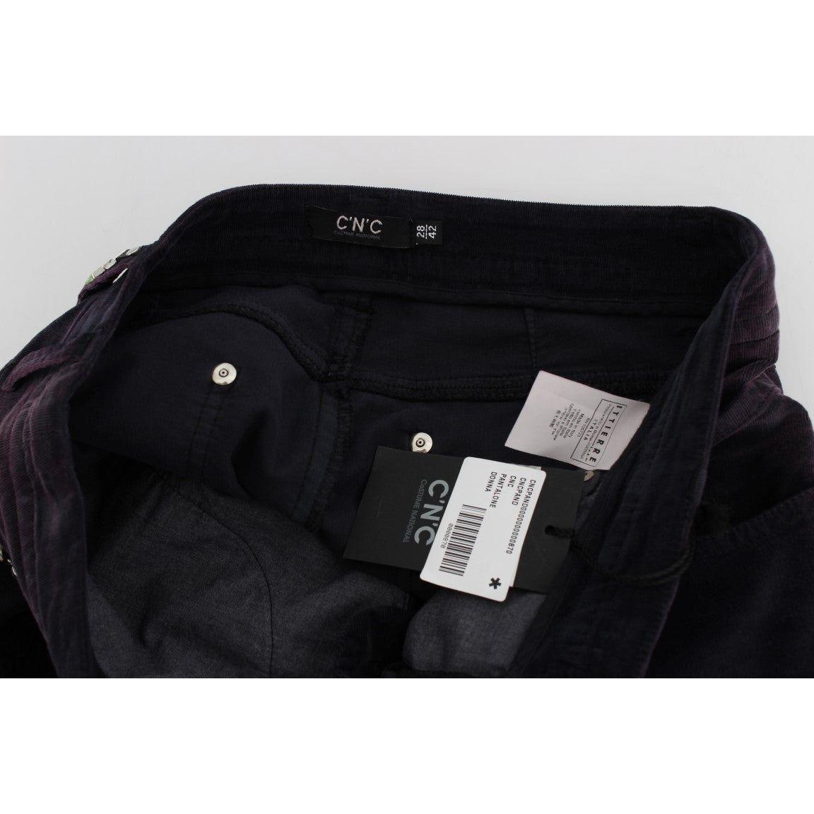 زي وطني أنيق من قماش مخملي مقصوص باللون الأرجواني