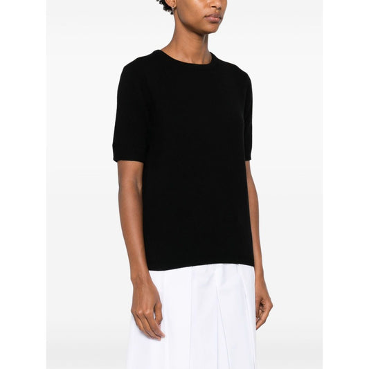 SOFT GOAT Sweaters Black cashmere crewneck top with ribbed trim and short sleeves, modeled against a white background.
