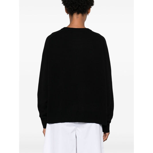 Rear view of SOFT GOAT Sweaters Black, cashmere boyfriend crewneck jumper, ribbed trim long sleeves, elegant style for women.