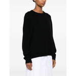 Woman wearing SOFT GOAT Sweaters Black ribbed trim cashmere crew neck jumper.