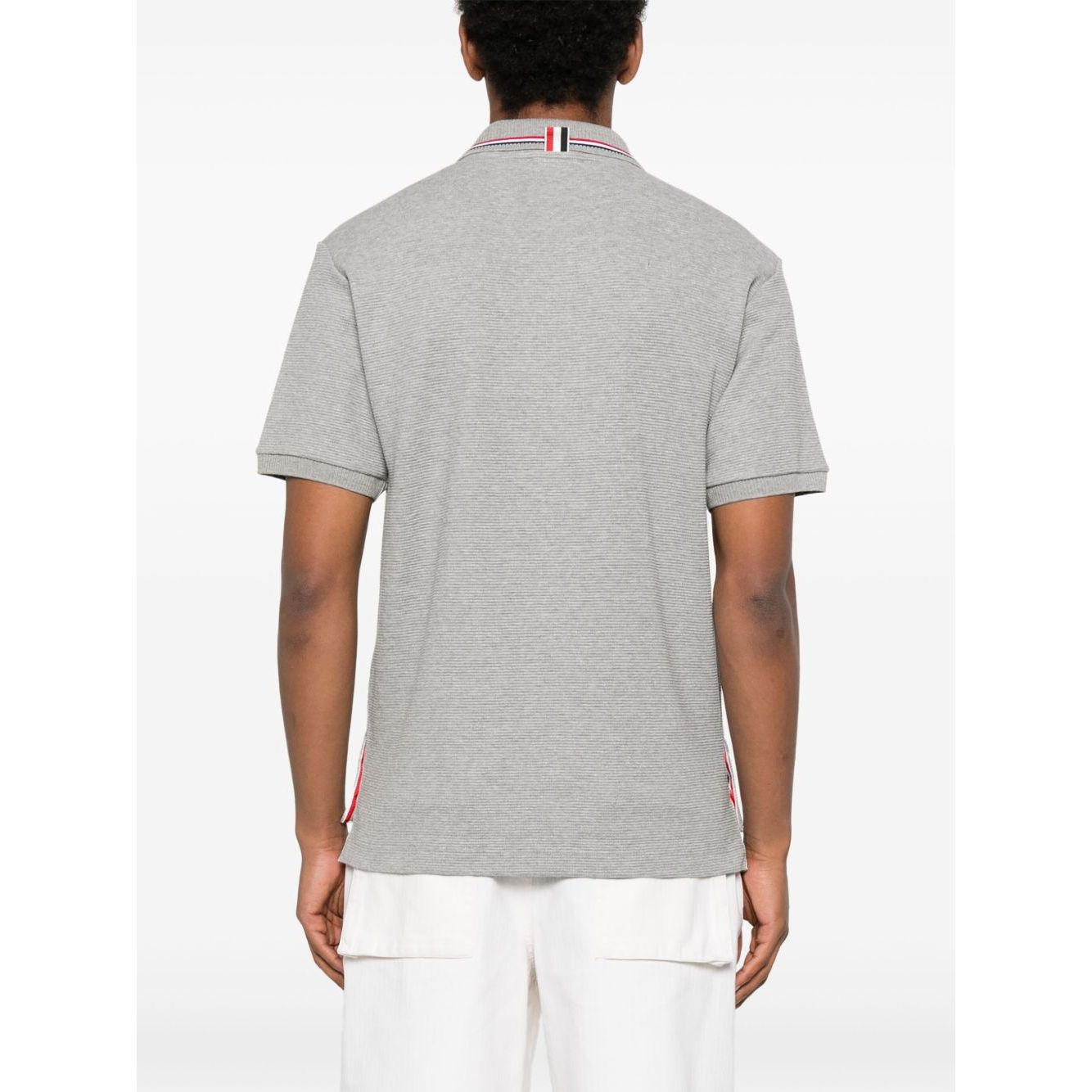 Back view of Thom Browne T-shirts and Polos Light Grey with polo collar and short sleeves, featuring the signature Rwb stripe.