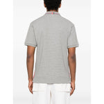 Back view of Thom Browne T-shirts and Polos Light Grey with polo collar and short sleeves, featuring the signature Rwb stripe.