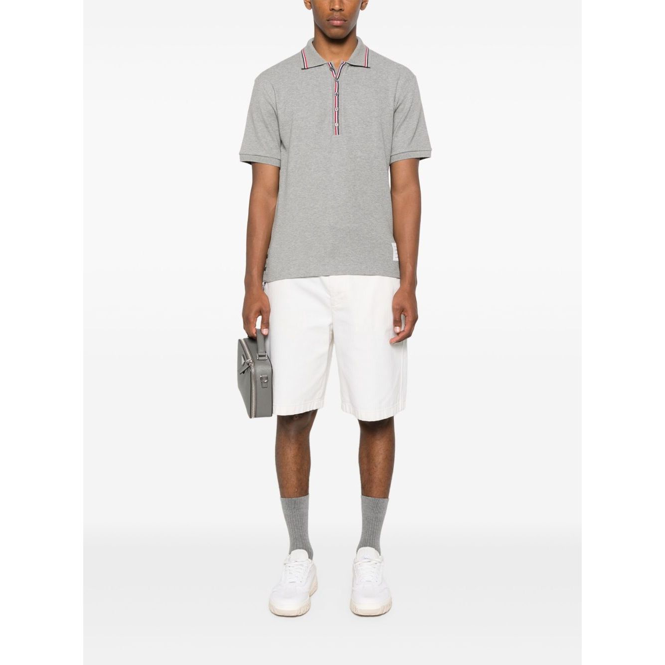 Thom Browne T-shirts and Polos Light Grey featuring a grey cotton polo shirt with button placket and short sleeves.
