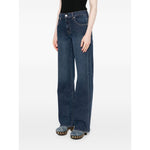 Seven Jeans Blue navy denim wide-leg jeans with button fly and five pockets.