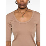 Woman wearing Fabiana Filippi Sweaters Camel, light brown short sleeves, round neckline with embellishment, perfect for casual wear.