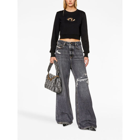 Diesel Sweaters Black with cut-out detailing, long sleeves, and cropped hem, worn by model with black jeans and stylish handbag.