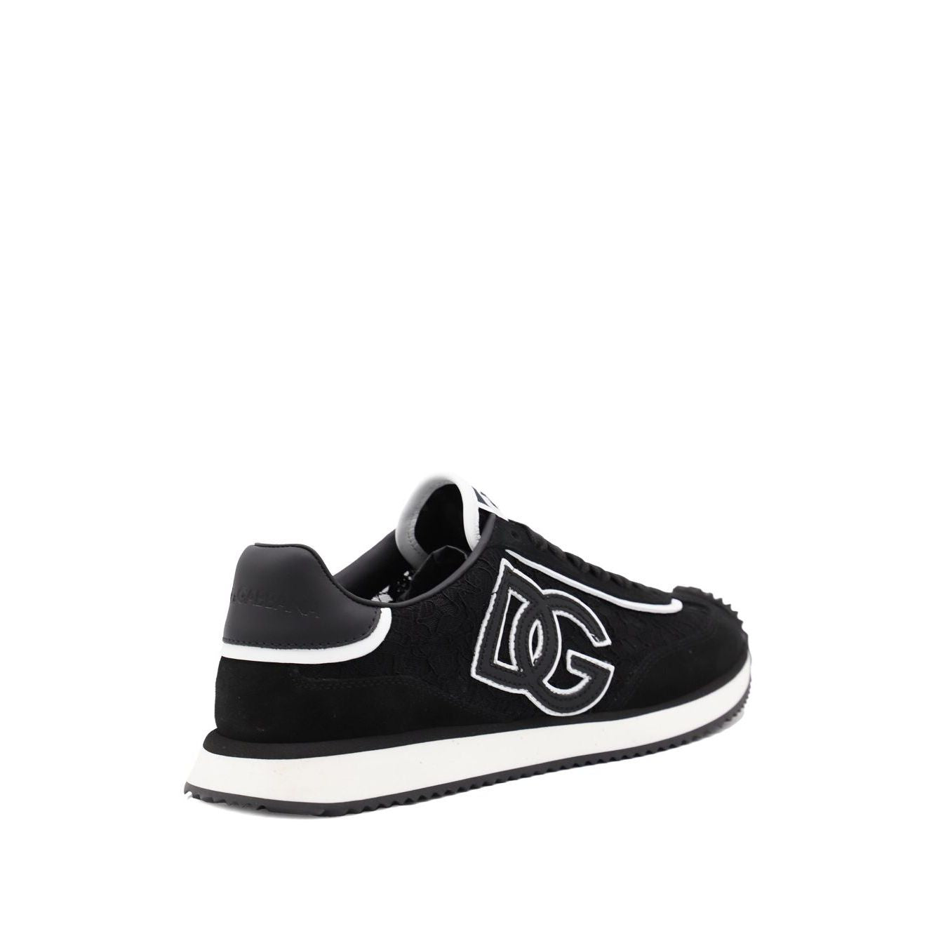 Dolce & Gabbana Sneakers Black with rubber sole and branded heel counter, showcasing DG logo on a sleek design.
