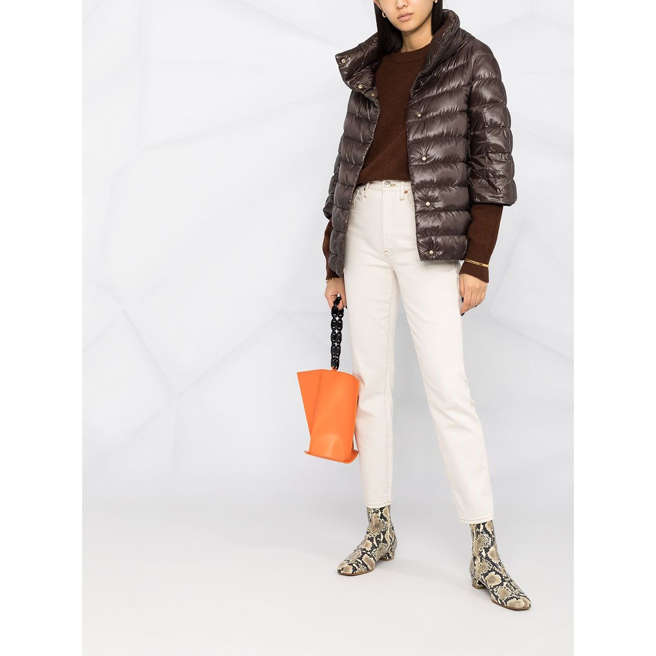 Herno Jackets Brown padded design with high neck and 3/4 sleeves, styled with white pants and orange bag.