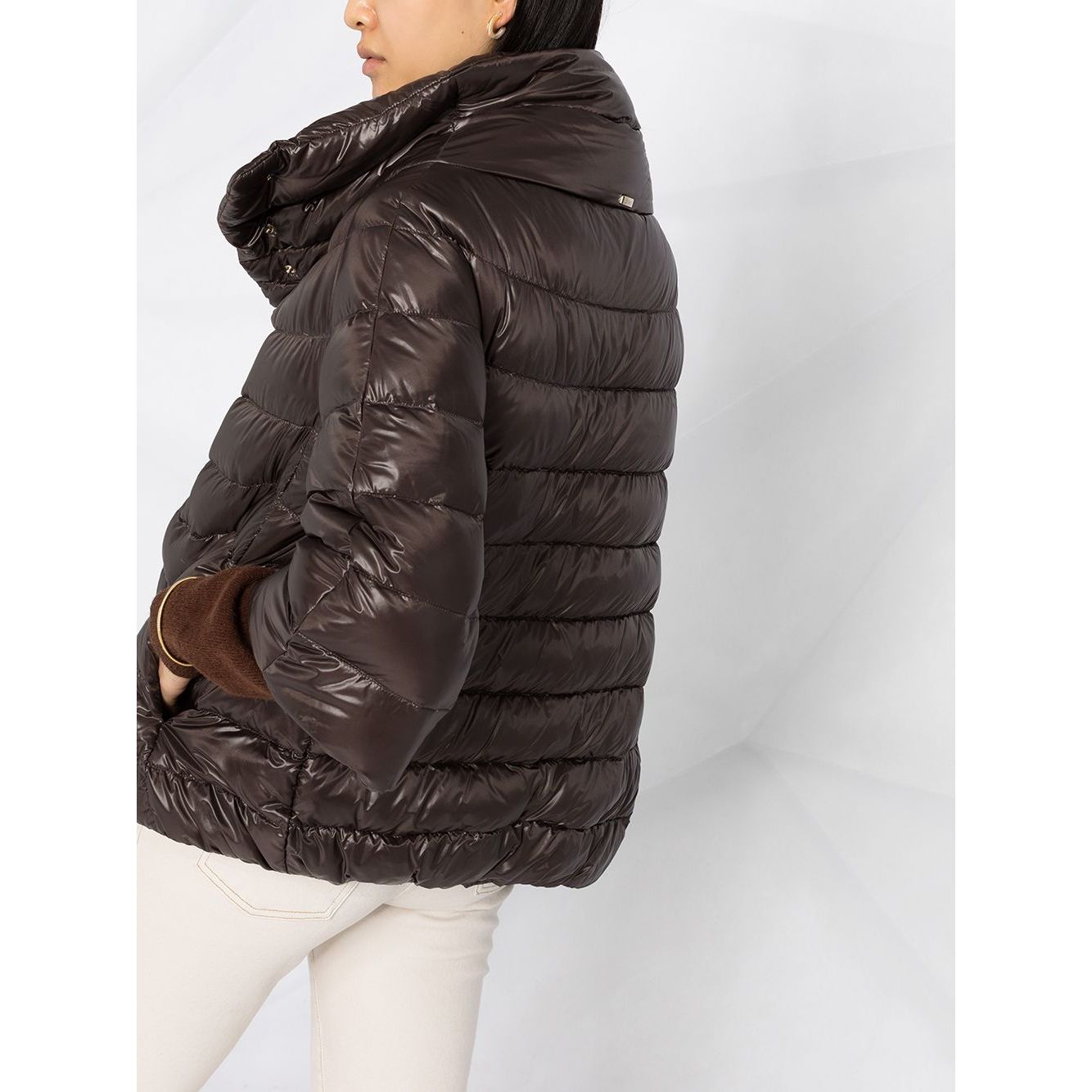 Herno Jackets Brown Aminta nylon cape with padded design and high neck, featuring hidden front closure and 3/4 length sleeves.