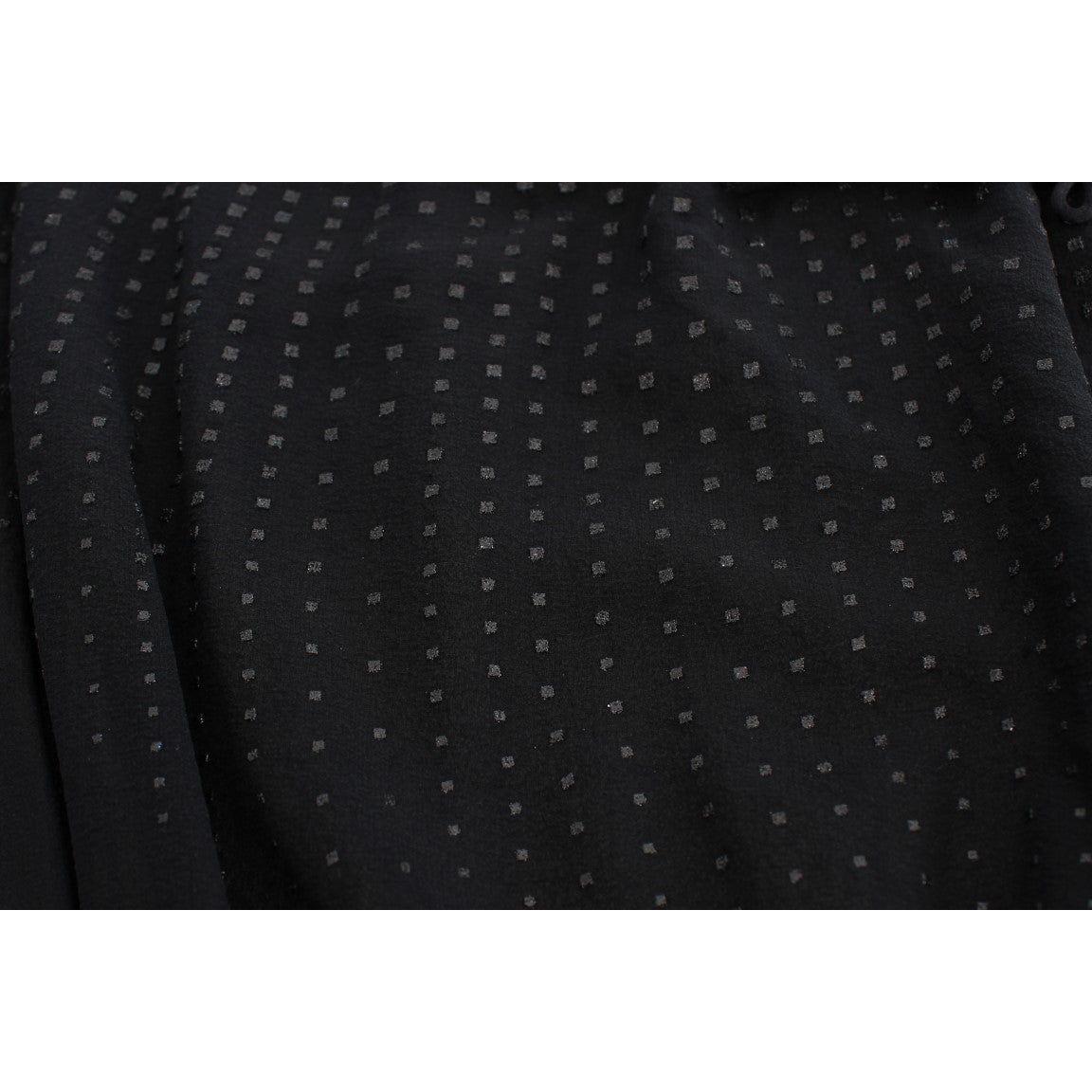 بلوزة سهرة أنيقة باللون الأسود من إكستي