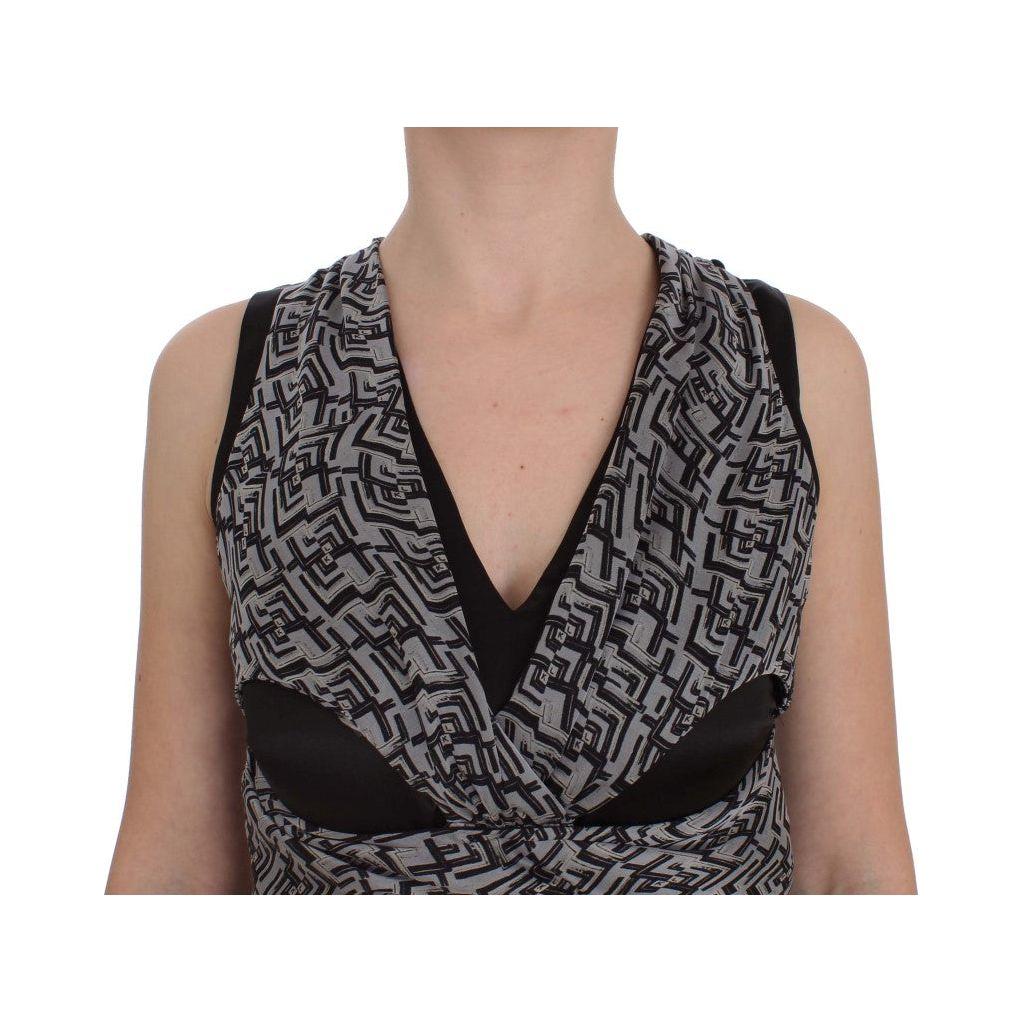 بلوزة أنيقة من الحرير من تصميم كارل لاغرفيلد مع تفاصيل الشعار