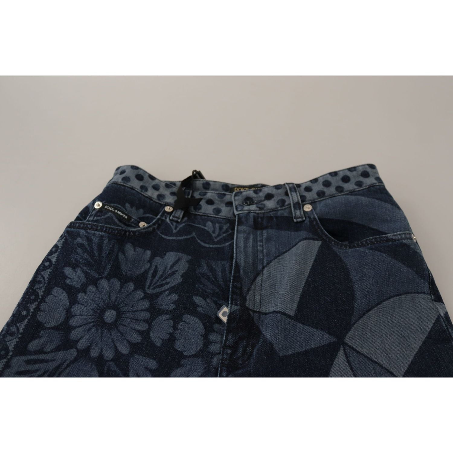 بنطلون جينز ضيق أنيق بنقشة زهور من دولتشي آند غابانا