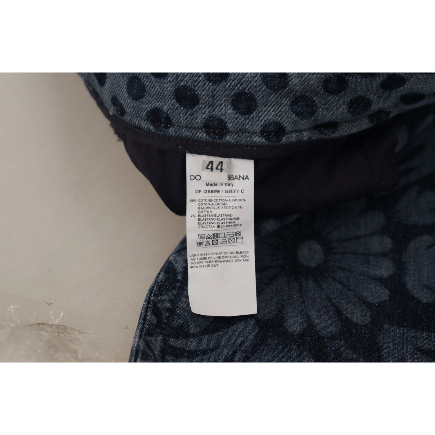 بنطلون جينز ضيق أنيق بنقشة زهور من دولتشي آند غابانا