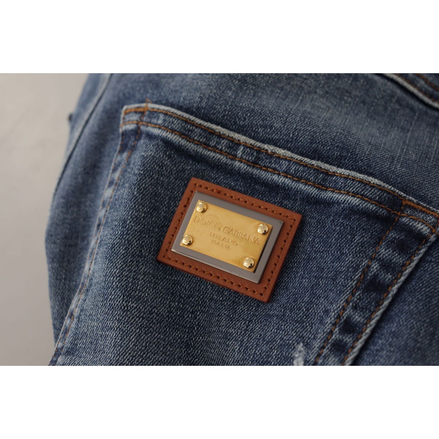 بنطلون جينز ضيق بخصر مرتفع من دولتشي آند غابانا باللون الأزرق