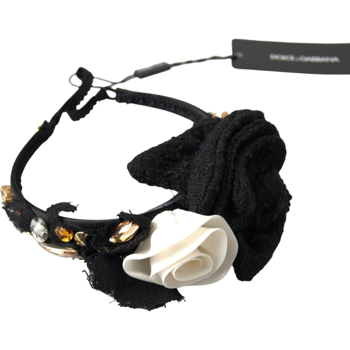 Dolce Gabbana crystal diadem headband featuring a black fabric design with a white rose and gold embellishments.