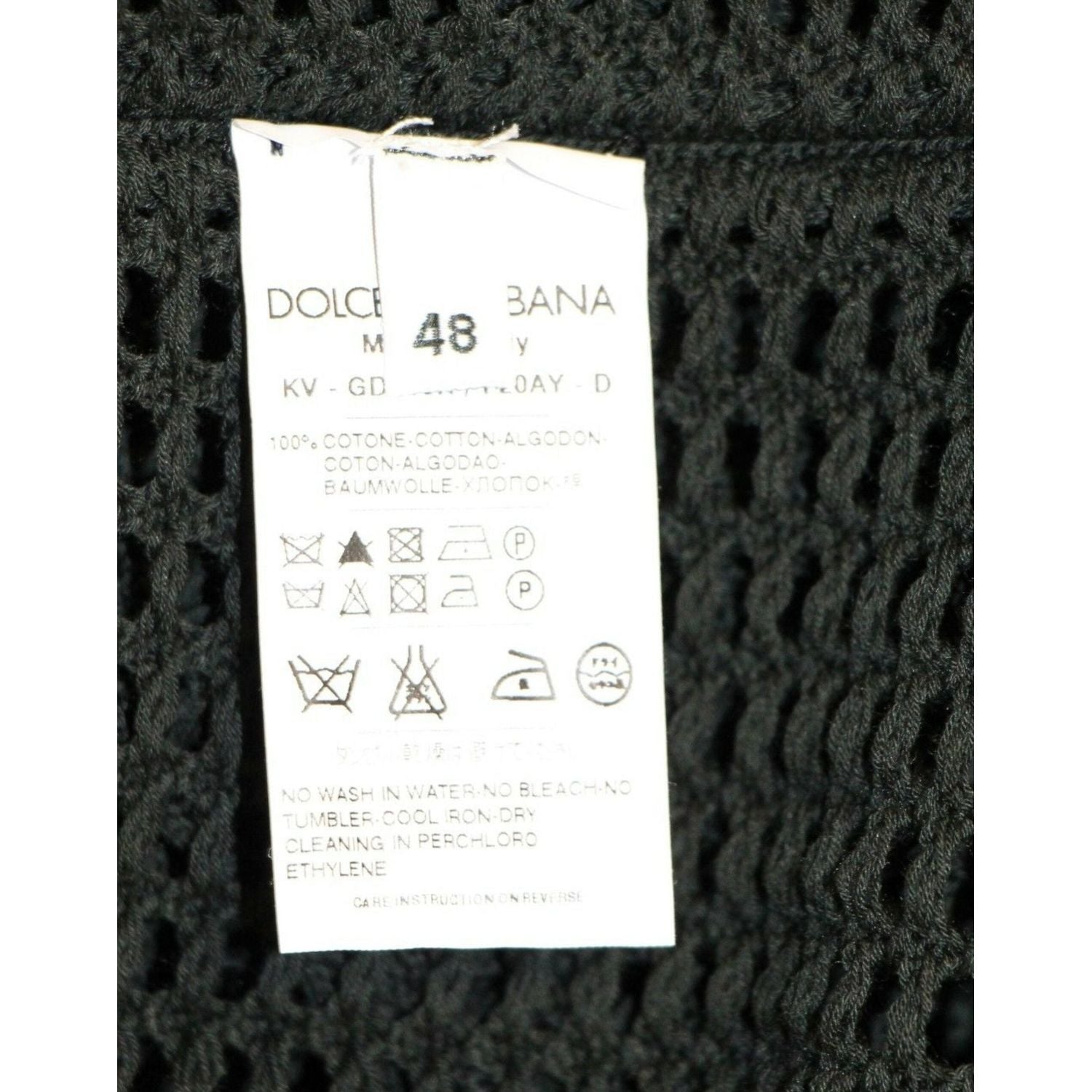 سترة محبوكة أنيقة بفتحة رقبة على شكل حرف V باللون الأخضر الداكن من دولتشي آند غابانا