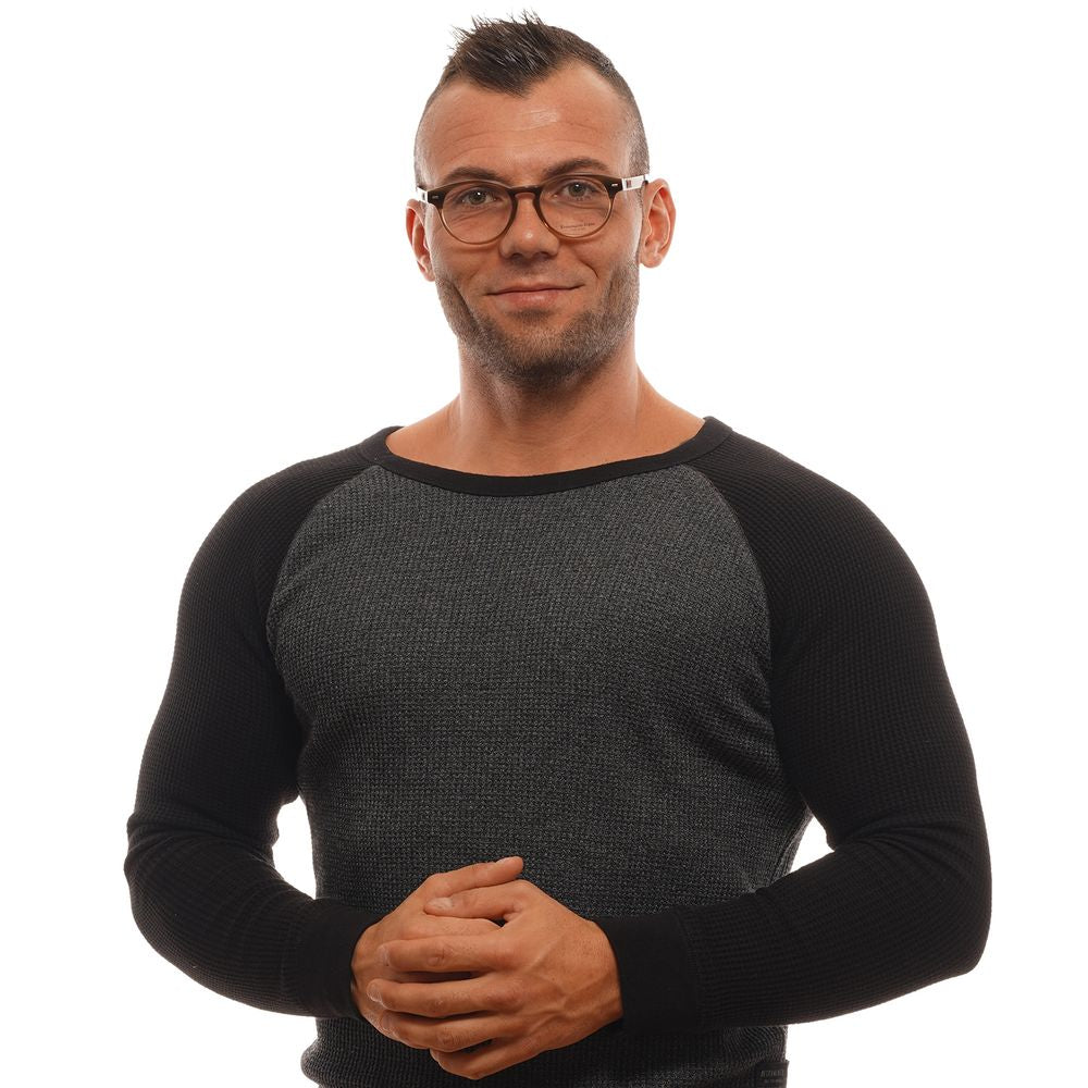 Man wearing Ermenegildo Zegna Brown Men Glasses Frame with plastic full-rim, round style, standing against a white background.