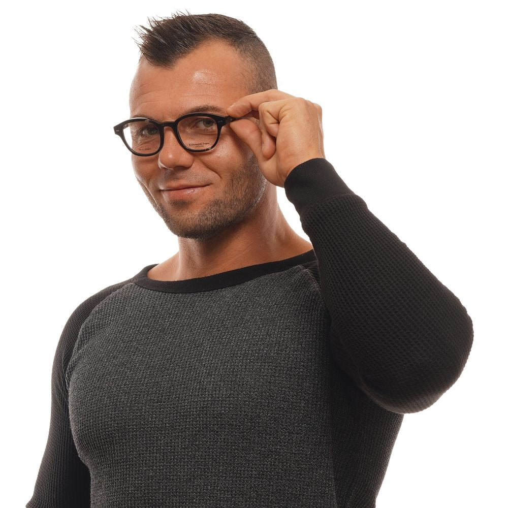 Man wearing Ermenegildo Zegna Brown Men Glasses Frame with a smile.