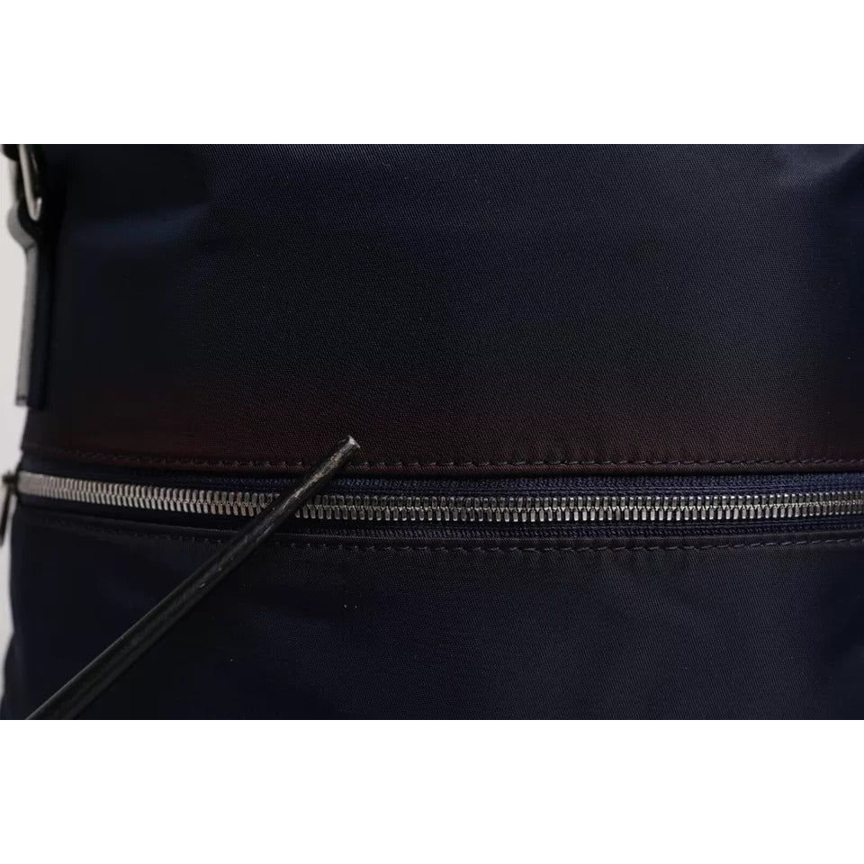 Front view with bag zipped and handles upright.