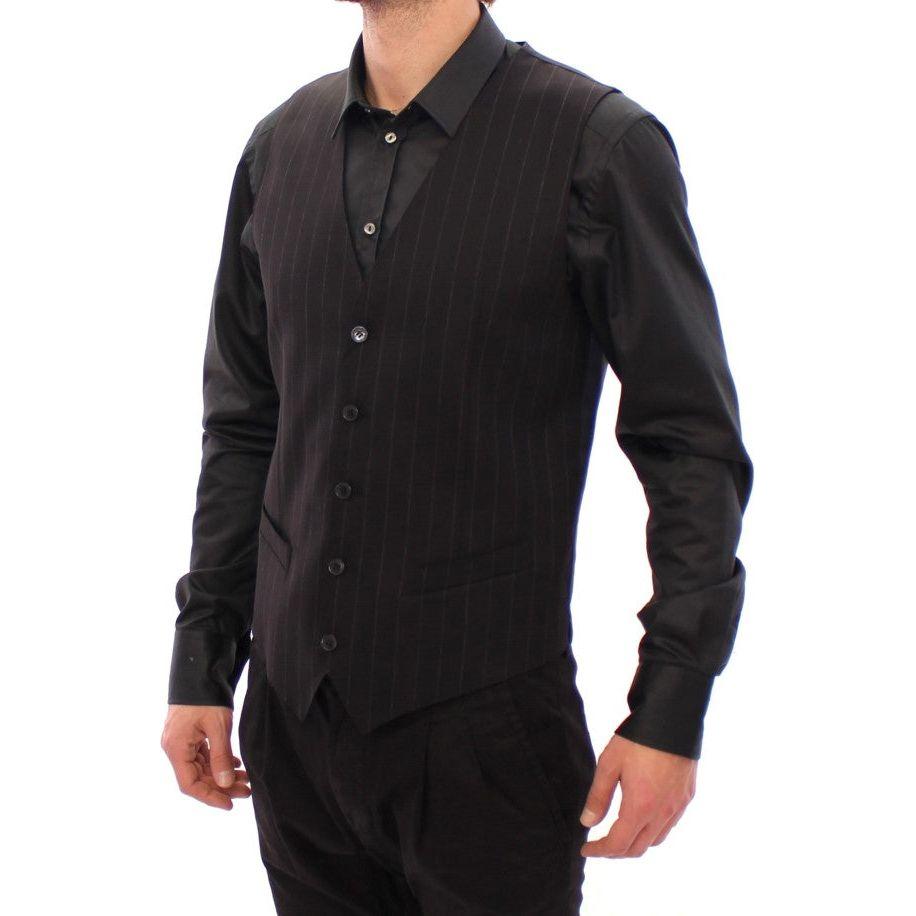 فستان من الصوف المخطط باللون الأسود من دولتشي آند غابانا