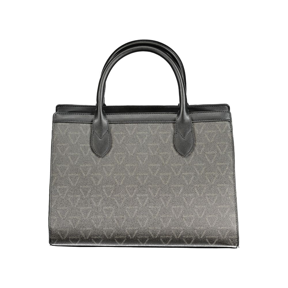 Front view with bag zipped and handles upright.