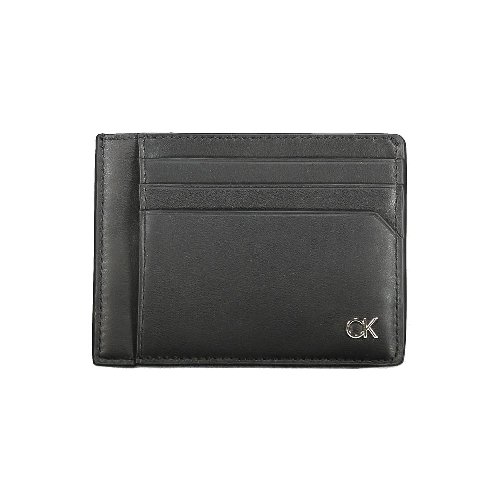 Calvin Klein Black Leather Wallet with logo, card holder, one compartment, coin pocket, and spaces for cards.