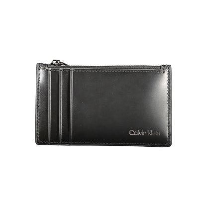 Calvin Klein Black Leather Wallet with card holder, central zip pocket, spaces for cards, and logo.