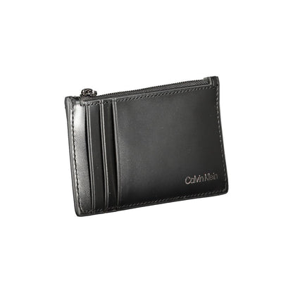 Calvin Klein Black Leather Wallet with card holder, central zip pocket, and logo branding.