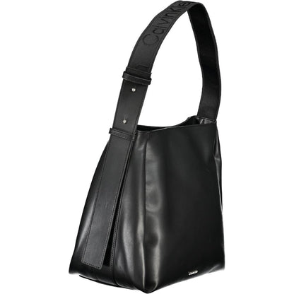 Calvin Klein Black Polyester Handbag with adjustable shoulder handle, multiple compartments, and a stylish logo detail.