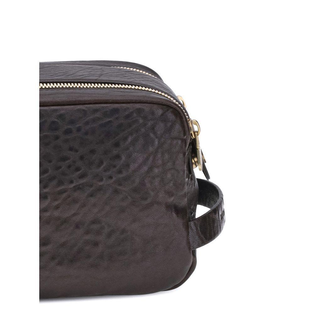 Front view with bag zipped and handles upright.