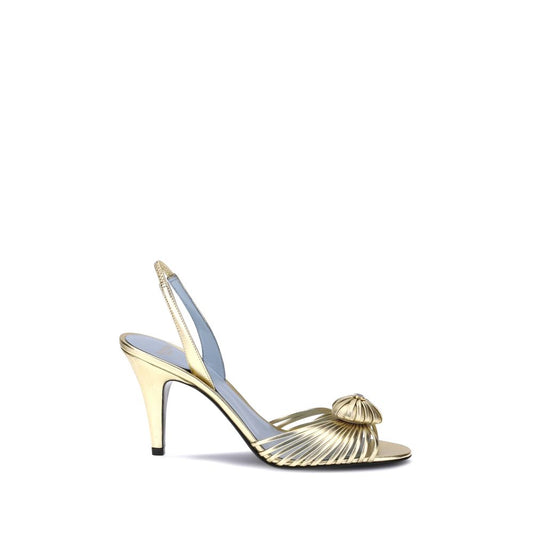 Valentino Garavani Royal Sandals showcasing laminated calfskin with a leather heart and VLogo, slingback style for comfort and stability.