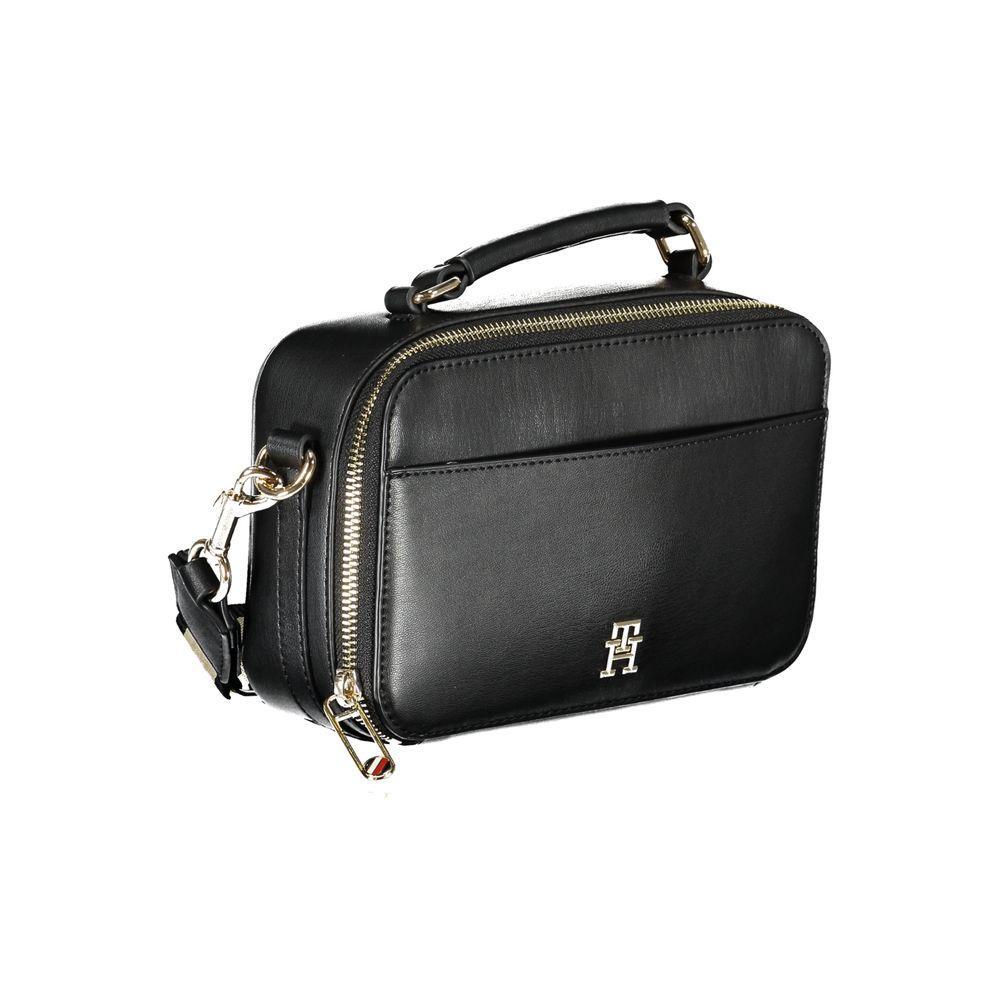 Front view with bag zipped and handles upright.