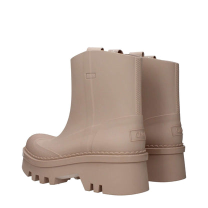 Chloé Pink Cotton Ankle Boots with beige rubber sole, mid heels, and back logo. Style: Street with round toe. Perfect for any stylish wardrobe.