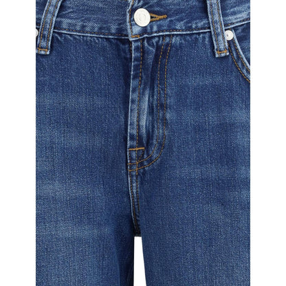 Close-up of 7FOR Blue Cotton Flared Jeans with classic five-pocket design and zip-button closure in dark blue denim.