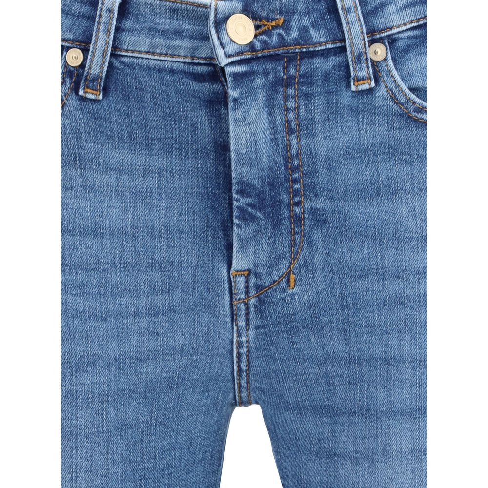 Close-up of 7FOR Blue Cotton Flared Jeans featuring five-pocket design and zip-button closure on Slim Illusion denim.