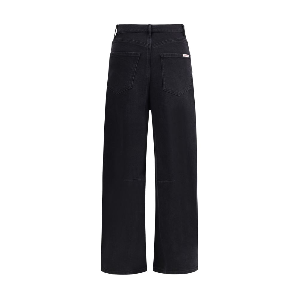 Back view of Self-Portrait Black Cotton High-Waisted Jean with barrel leg and five-pocket design, showcasing a modern silhouette.