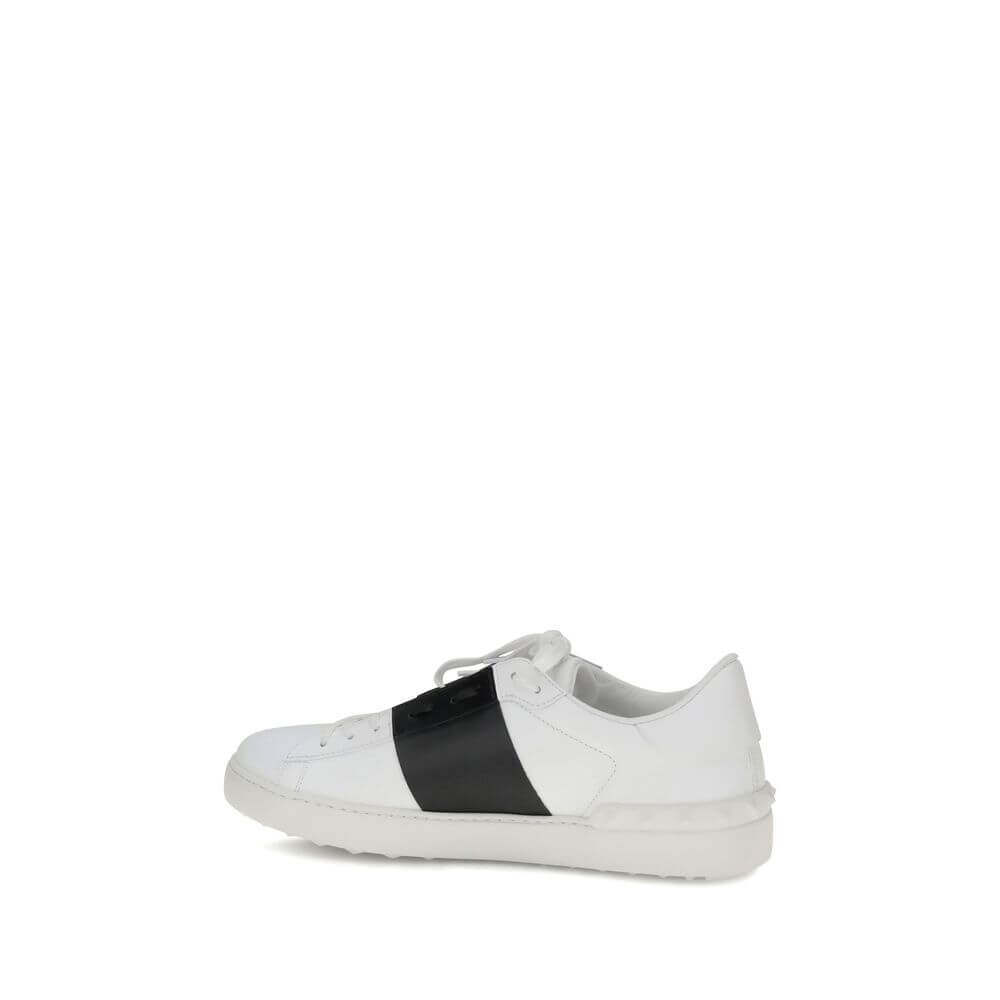 Valentino Garavani White Calf Leather Bos Taurus Low Top Sneakers with contrasting side bands and studs on heel.